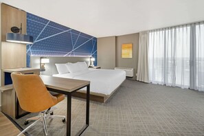 Desk, laptop workspace, blackout drapes, iron/ironing board