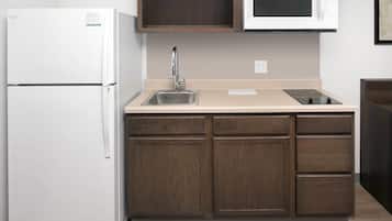 Full-size fridge, microwave, stovetop