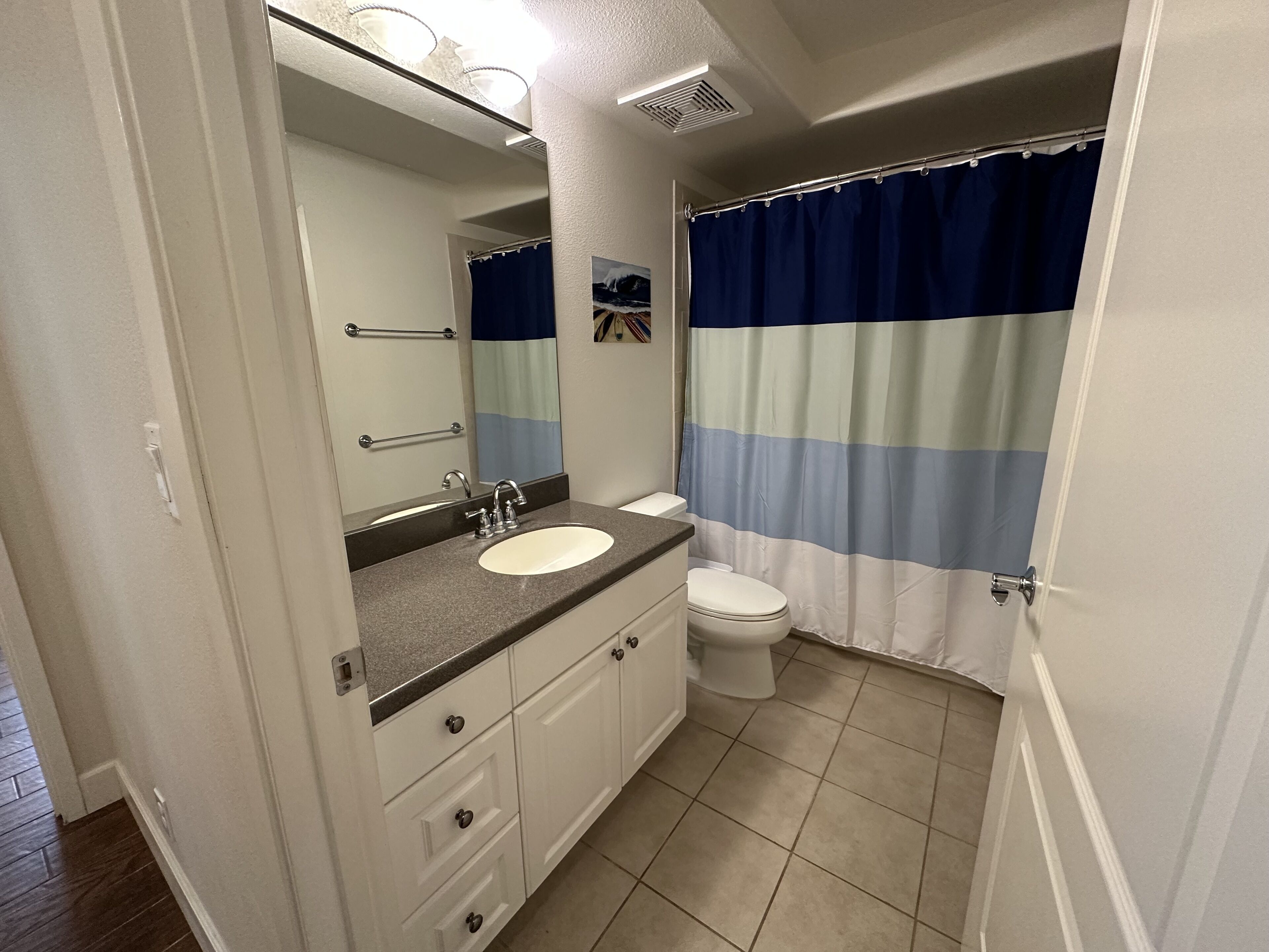 Combined shower/tub, hair dryer, towels, soap