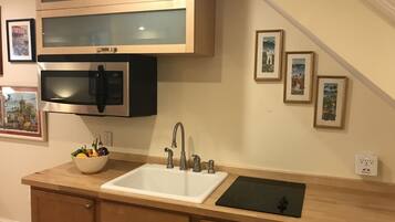 Fridge, microwave, stovetop, coffee/tea maker