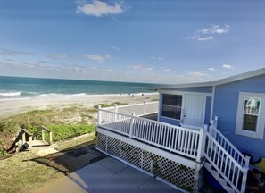 On the beach, sun loungers, beach towels
