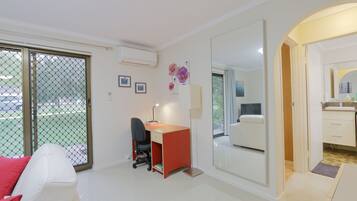 Parkline Deluxe Apartment, 2 Bedrooms | Living area | Flat-screen TV