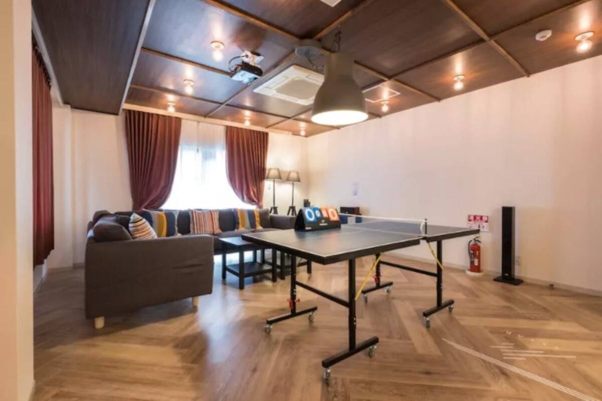 Standard Double Room (For 12 guests) | Living room | Flat-screen TV, video-game console, DVD player