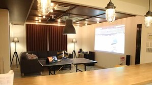 Standard Double Room (For 12 guests) | Living area | Flat-screen TV, video-game console, DVD player - Color Nipponbashi (Osaka)