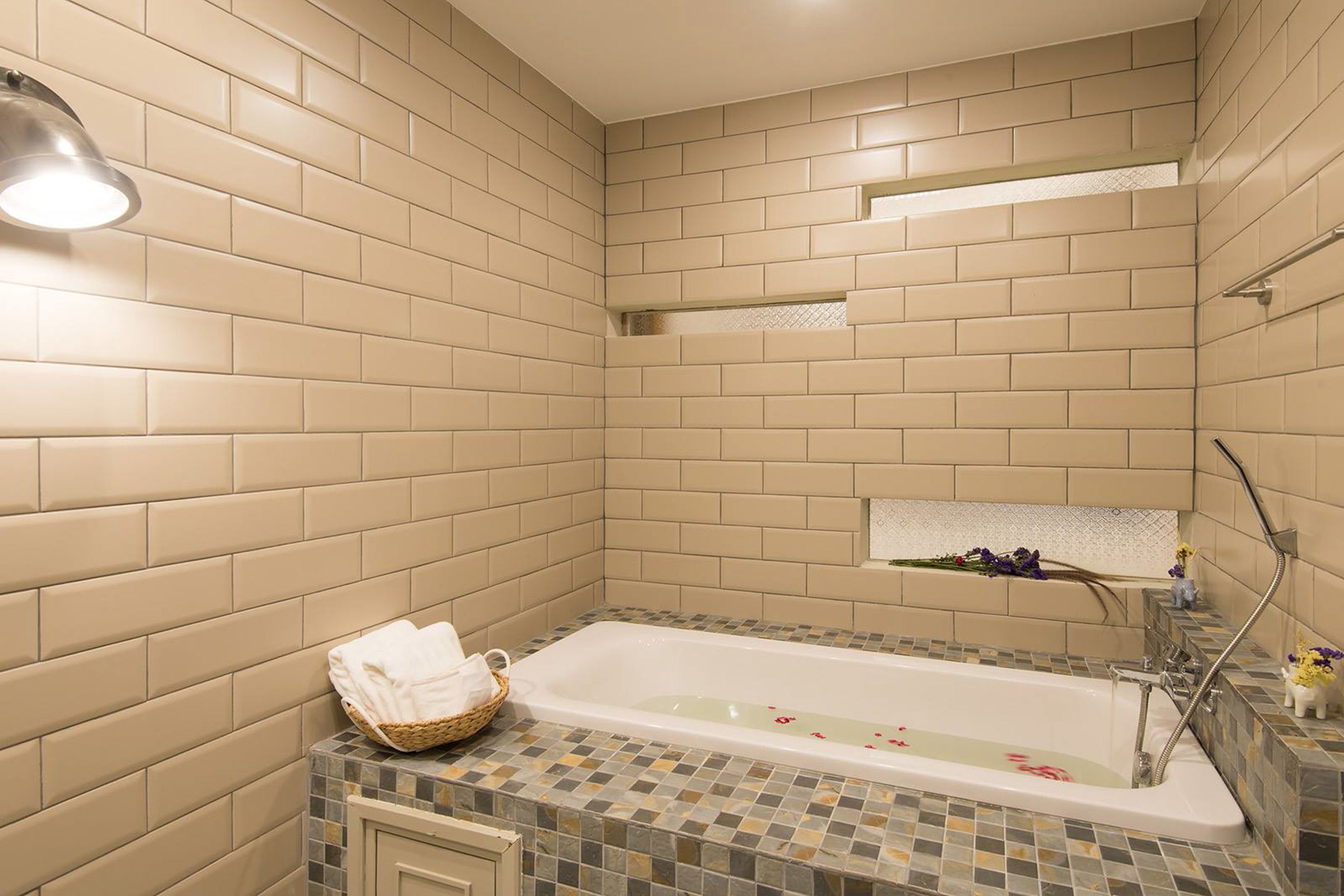 suite room with balcony | bathroom | free toiletries, hair dryer, slippers, towels