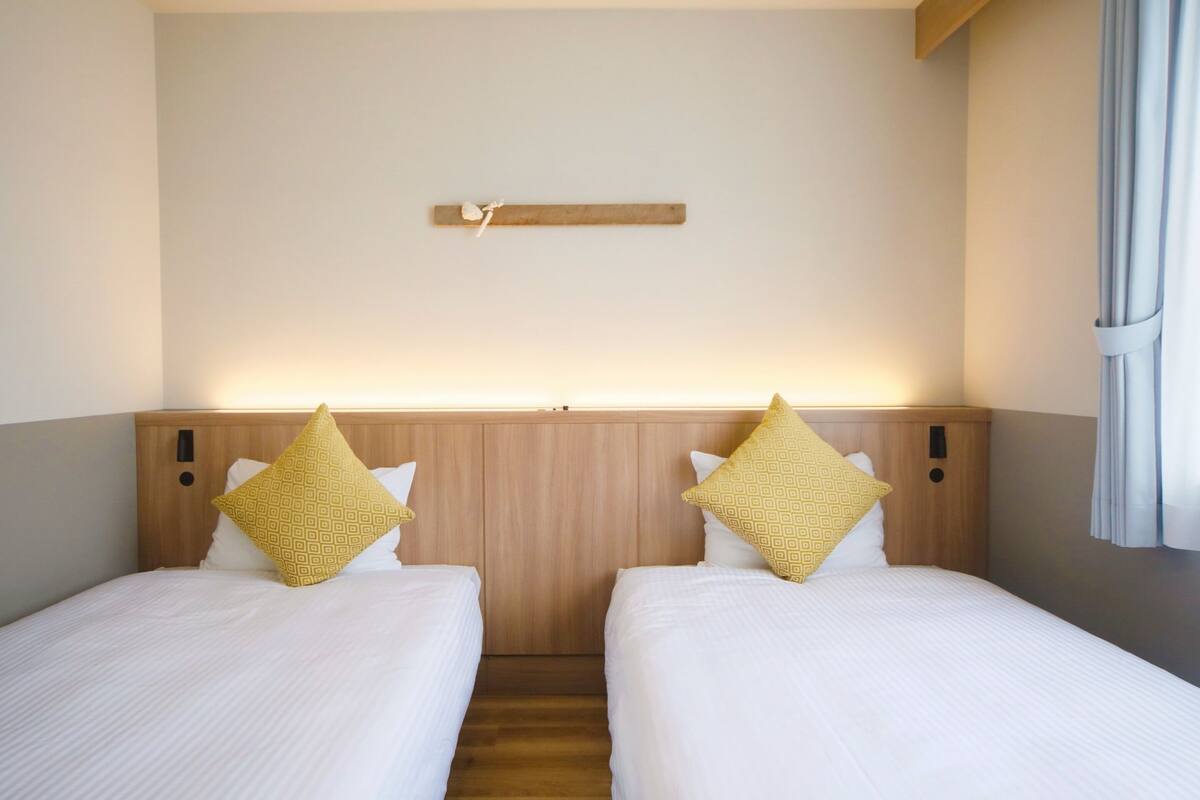 coral twin room, non smoking | 1 bedroom, in-room safe, desk, blackout curtains