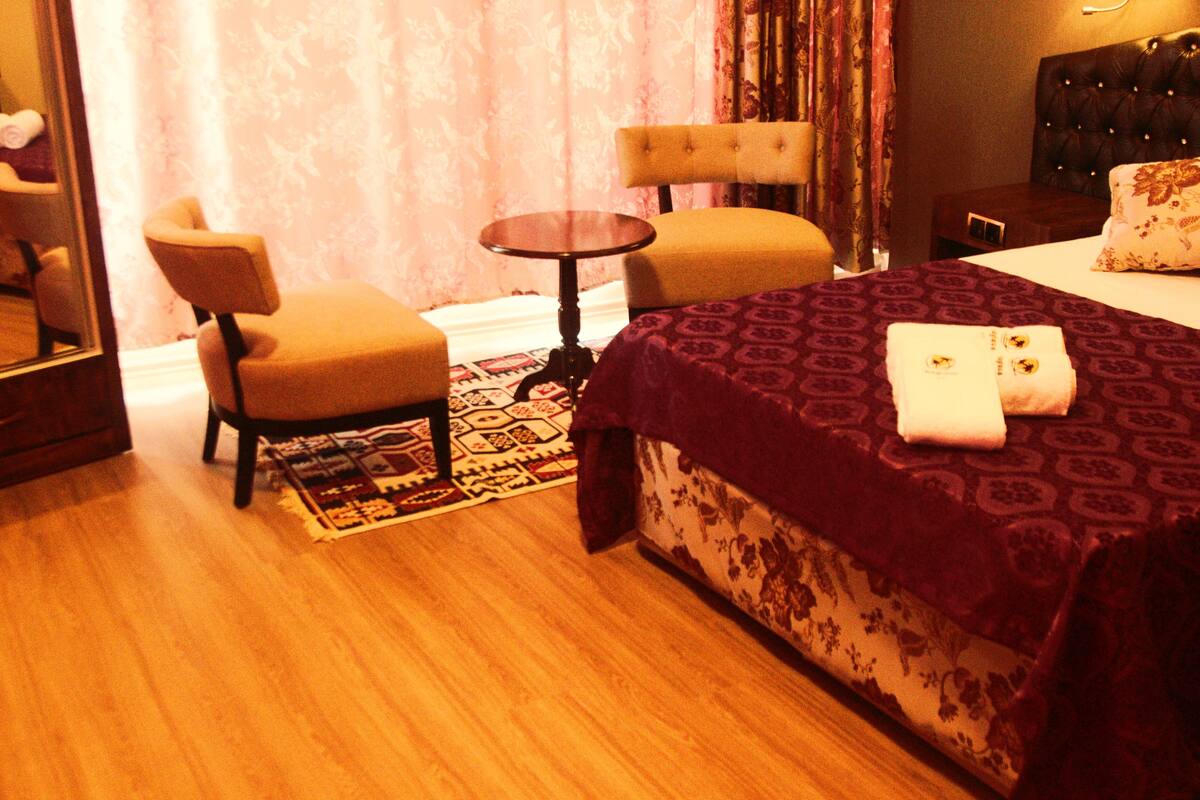 Family Room, Sea View | Living area | Flat-screen TV