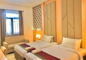 Executive kamer | Een minibar, een bureau, gratis wifi, beddengoed