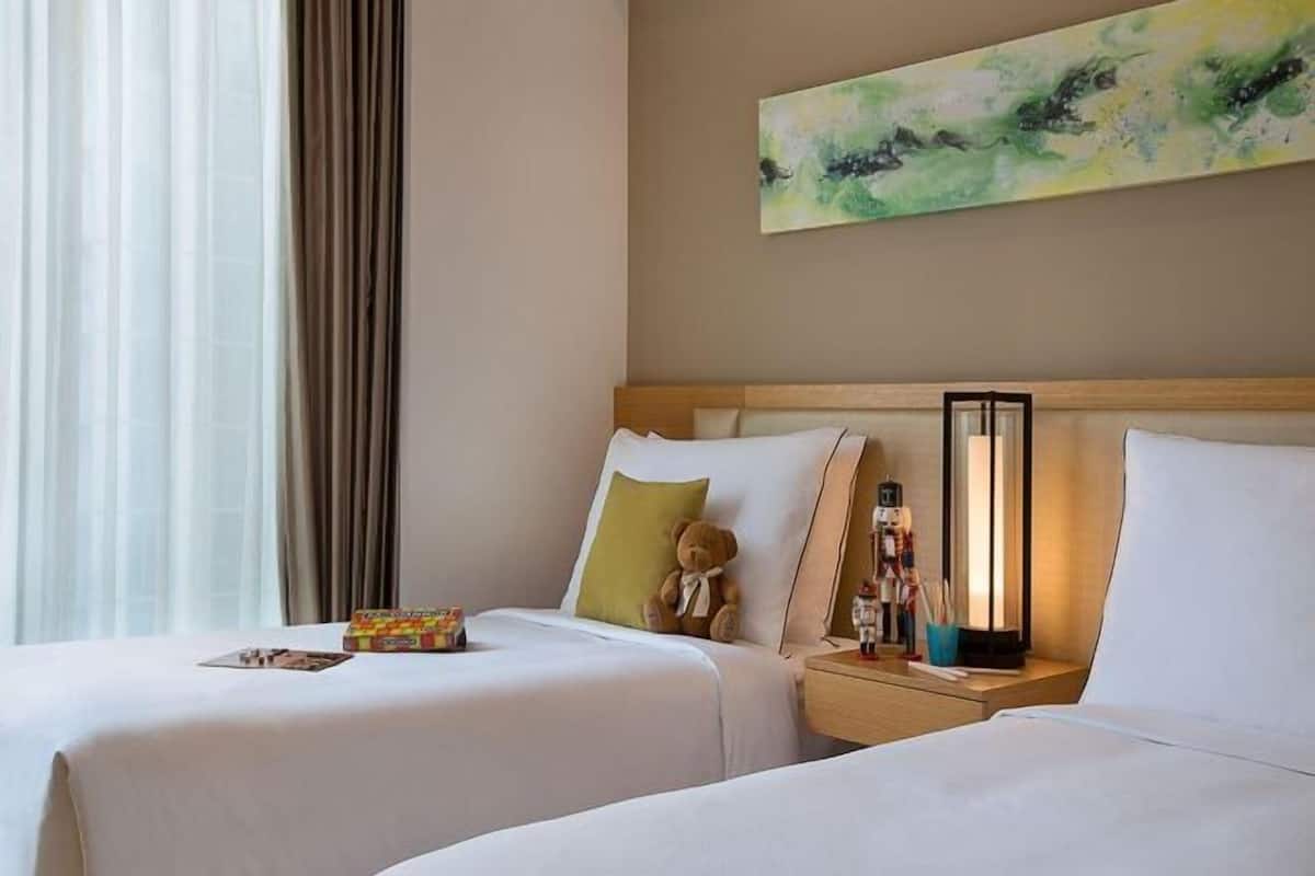 Premium bedding, down comforters, in-room safe, desk