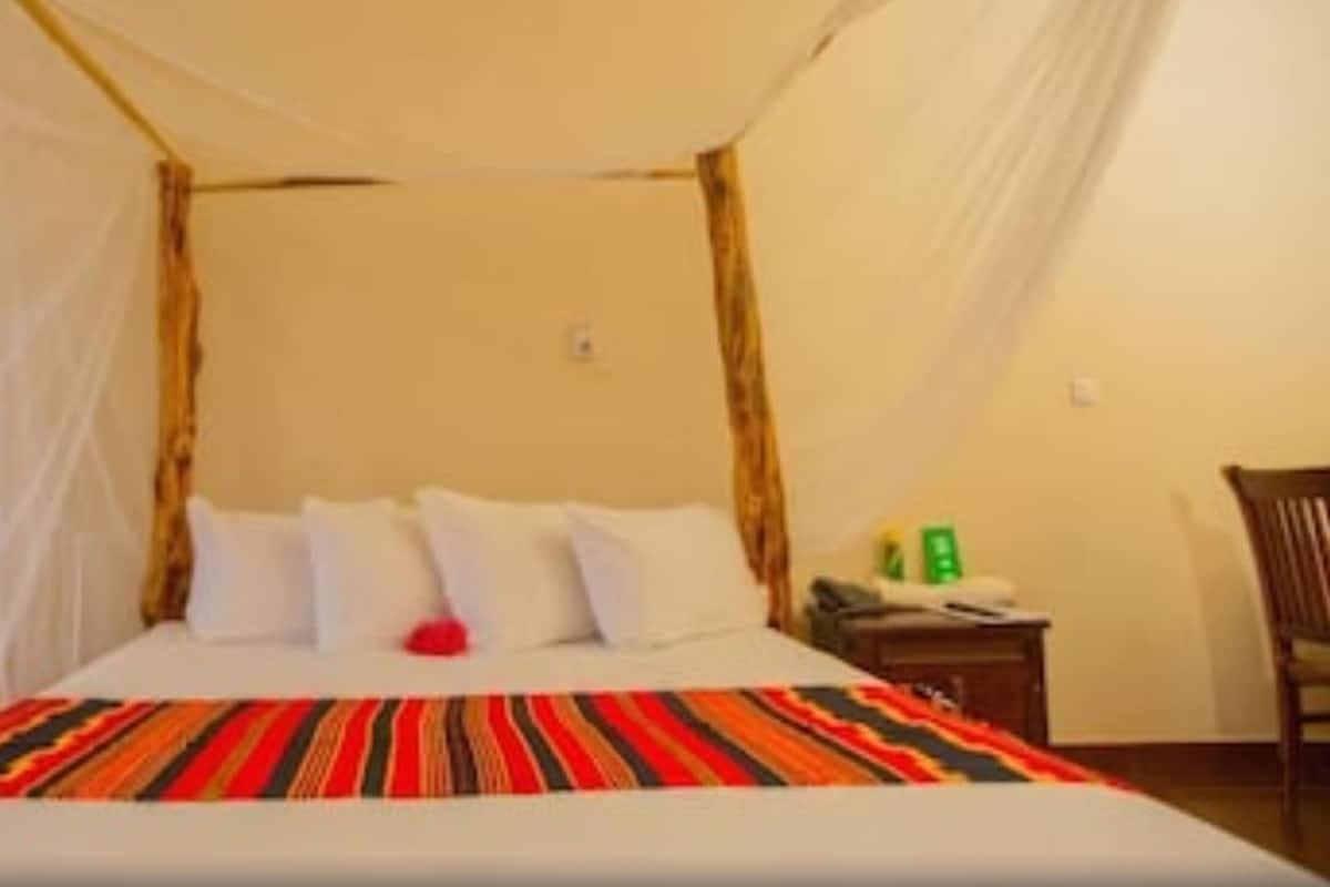 Room, 1 King Bed, Garden View (Zebra) | Minibar, in-room safe, free WiFi