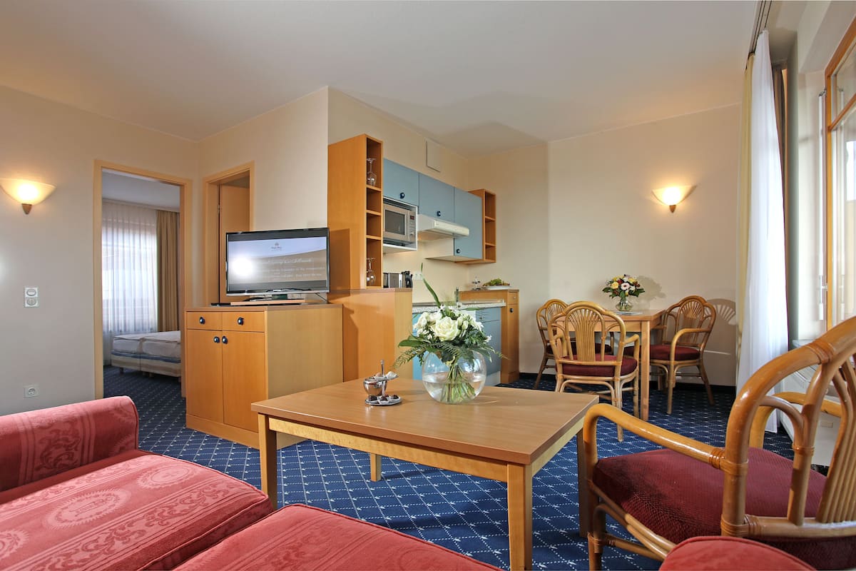 Classic Apartment, 1 Bedroom | Living room | Flat-screen TV