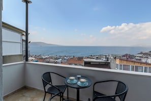 Superior Triple Room, Balcony, Sea View | Living area | 17-inch LED TV with satellite channels, TV, books - Olimpic Hotel (Istanbul)