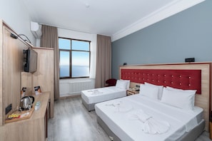 Superior Triple Room, Sea View | Minibar, in-room safe, blackout drapes, soundproofing - Olimpic Hotel (Istanbul)