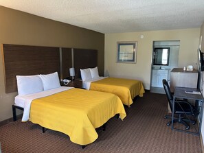 Premium bedding, memory-foam beds, desk, laptop workspace - Red Carpet Inn & Suites (Kinston)