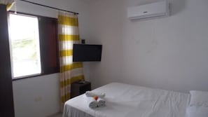 Appartamento, 1 camera da letto | Minibar, con stile personalizzato, ferro/asse da stiro, Wi-Fi gratuito