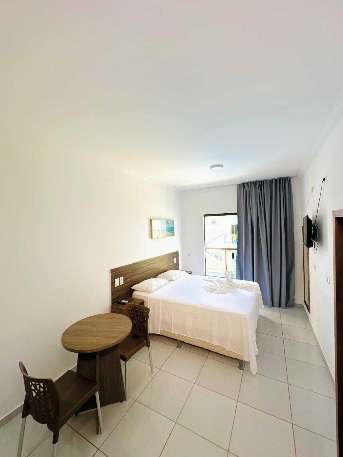 Quarto Standard com Cama de Casal ou 2 Camas de Solteiro com Varanda | Minibar, individually decorated, iron/ironing board, free WiFi