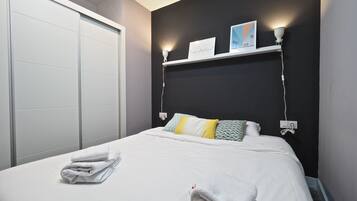 Apartment, 1 Bedroom, Ground Floor | 1 bedroom, blackout curtains, iron/ironing board, free WiFi