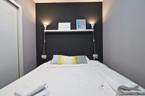 Apartment, 1 Schlafzimmer, Erdgeschoss | 1 Schlafzimmer, Verdunkelungsvorhänge, Bügeleisen/Bügelbrett