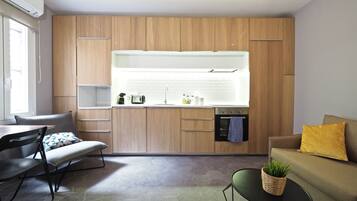 Apartment, 1 Bedroom, Ground Floor | Living area | Flat-screen TV