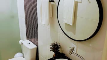 Family Apartment, 1 Bedroom | Bathroom | Shower, rainfall showerhead, hair dryer, towels