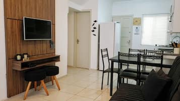 Family Duplex | Living area | 32-inch Smart TV with cable channels, TV, Netflix