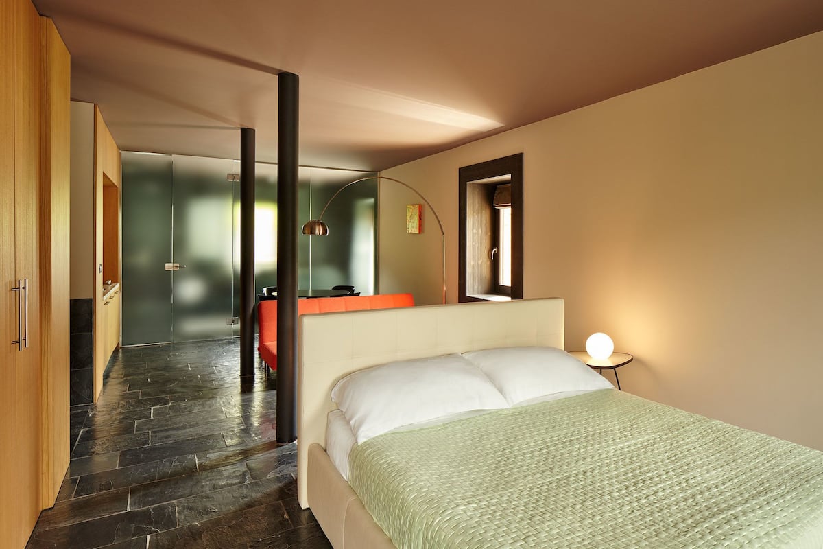 Suite, Terrace, Lake View | Desk, bed sheets