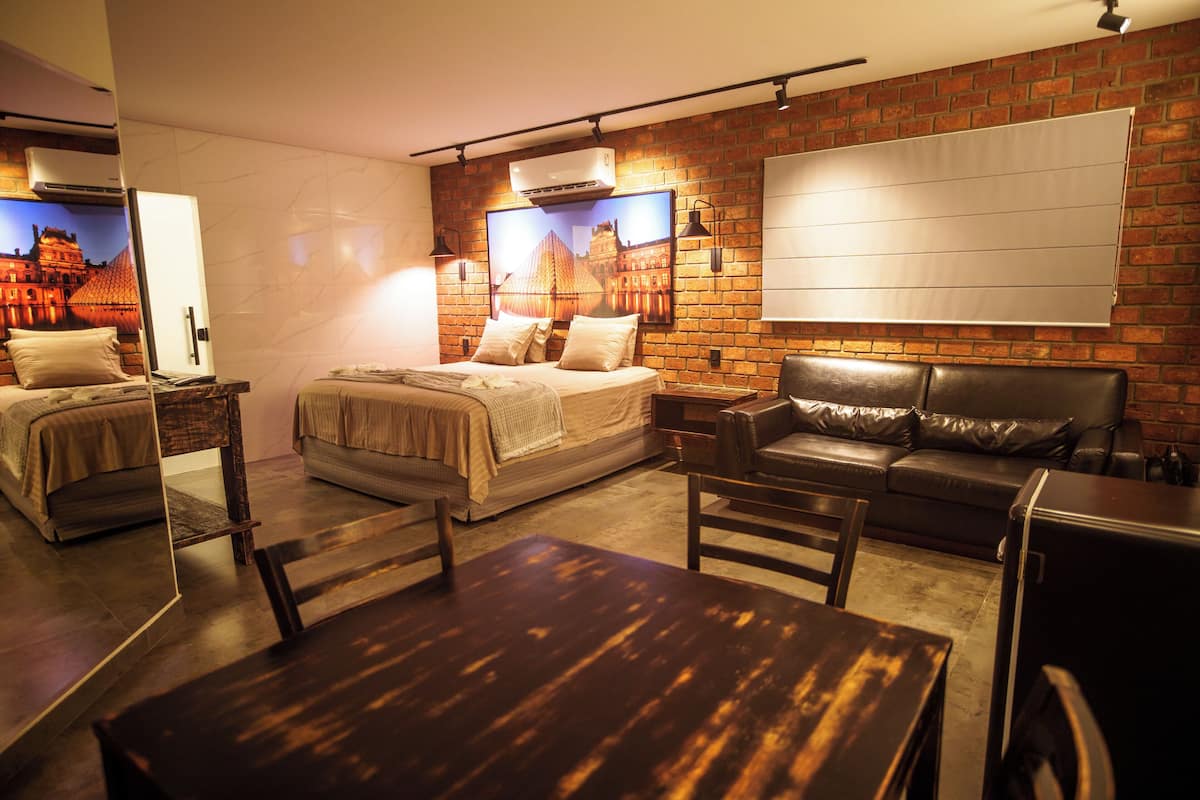 Luxury Room | Minibar, desk, laptop workspace, blackout curtains