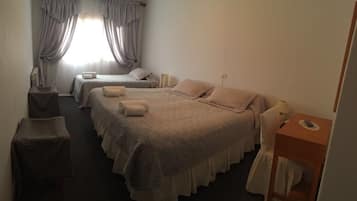 Standard Triple Room | Iron/ironing board, free WiFi
