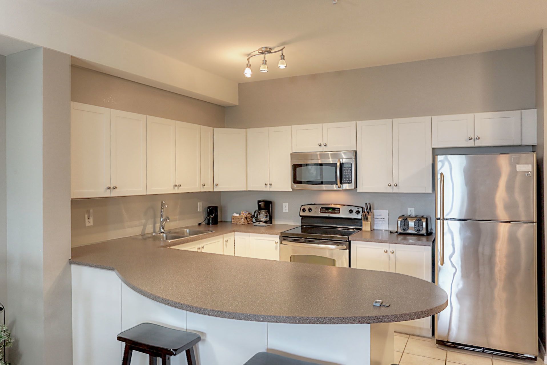 condo, 2 queen beds | 1 bedroom, desk, iron/ironing board, free wifi