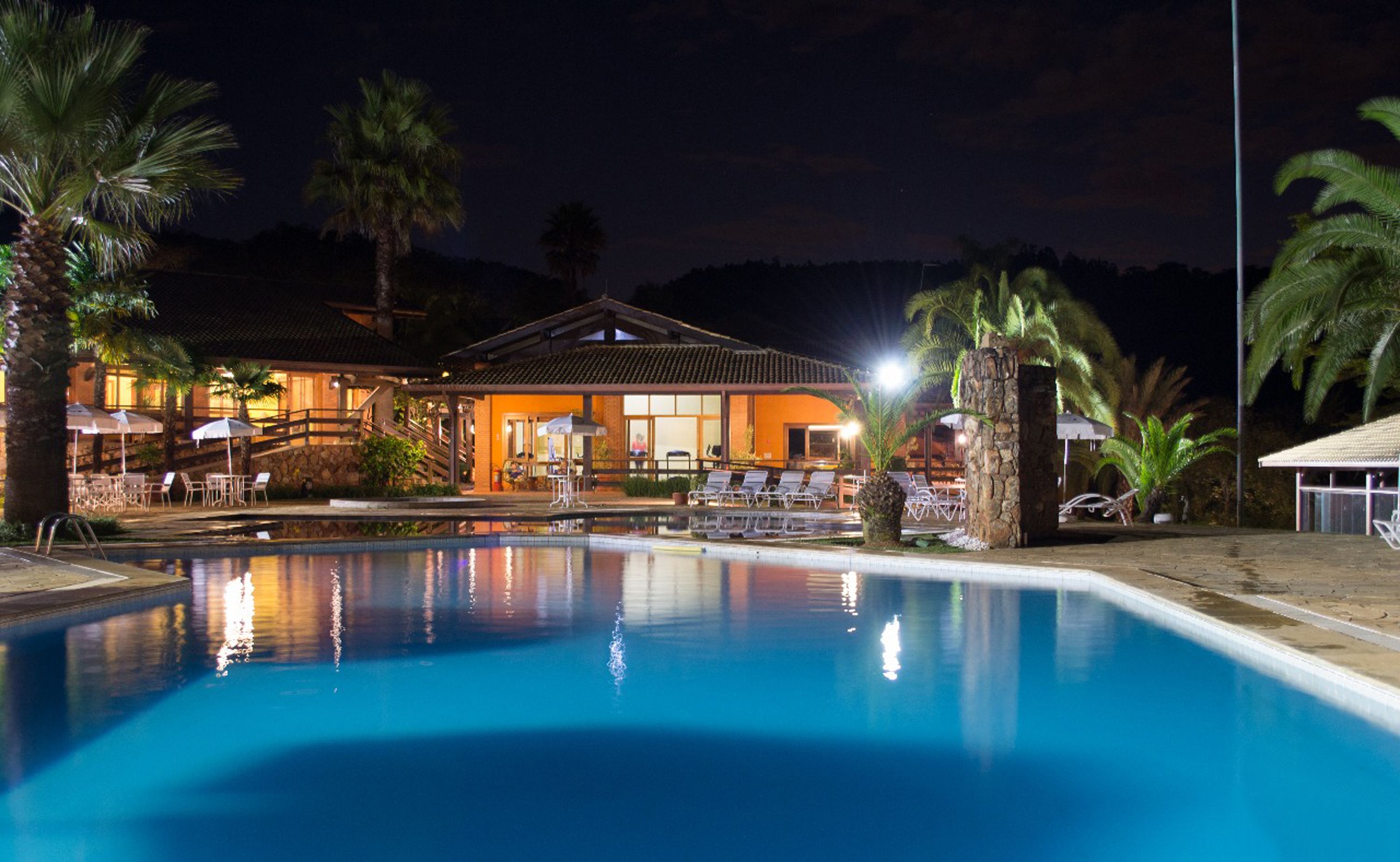 indoor pool, outdoor pool, pool umbrellas, pool loungers