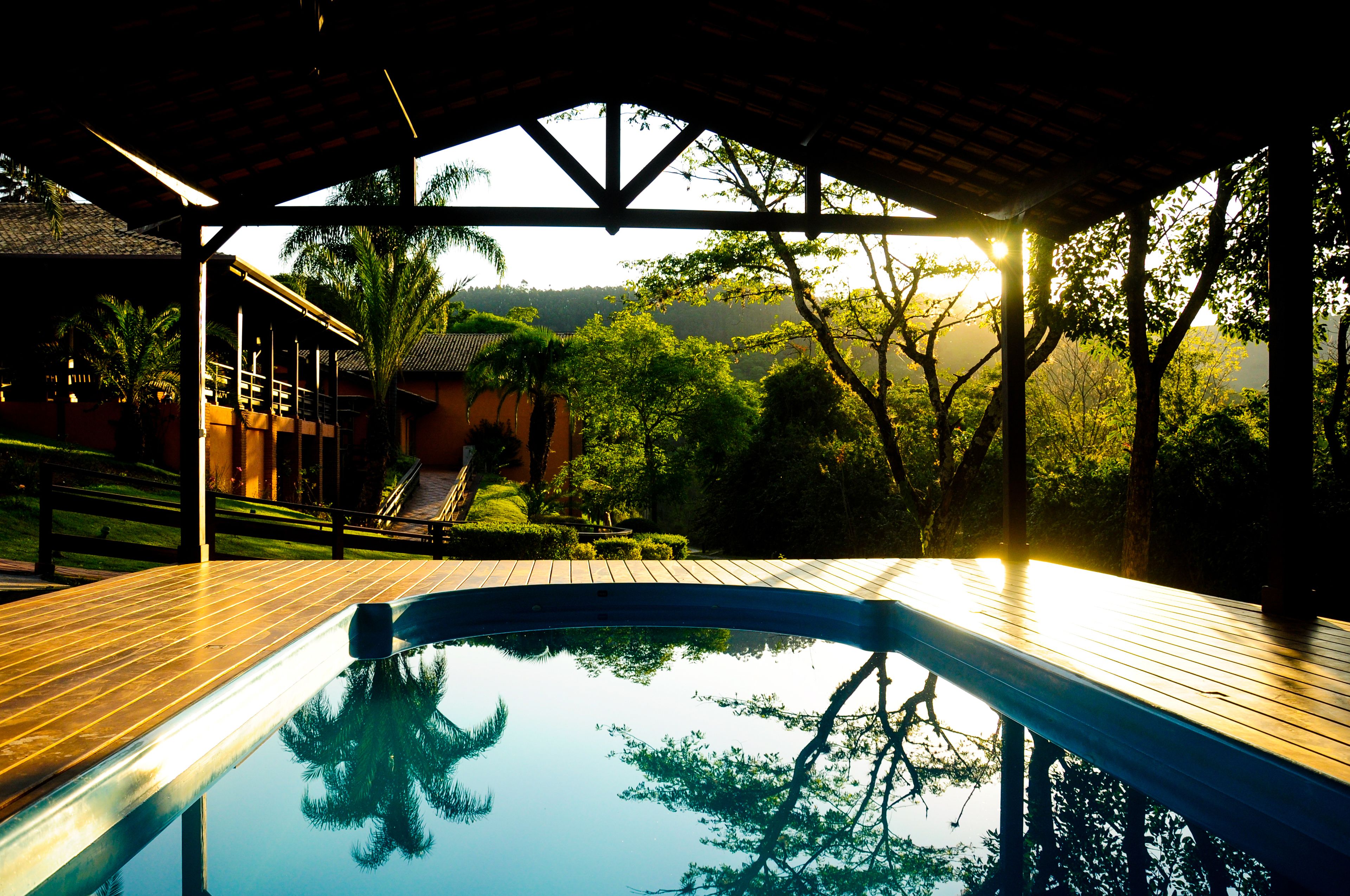 indoor pool, outdoor pool, pool umbrellas, pool loungers