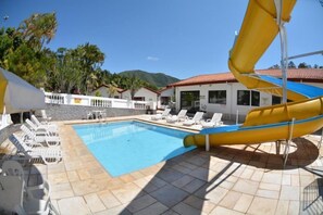 Indoor pool, outdoor pool, pool umbrellas, pool loungers