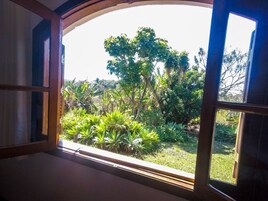 Suíte luxo | Vista para o jardim
