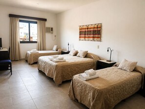 Basic Quadruple Room, 1 Bedroom | Premium bedding, in-room safe, blackout drapes, free WiFi