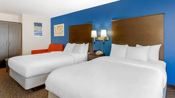 Suite, Multiple Beds, Non Smoking | Individually decorated, individually furnished, desk, laptop workspace