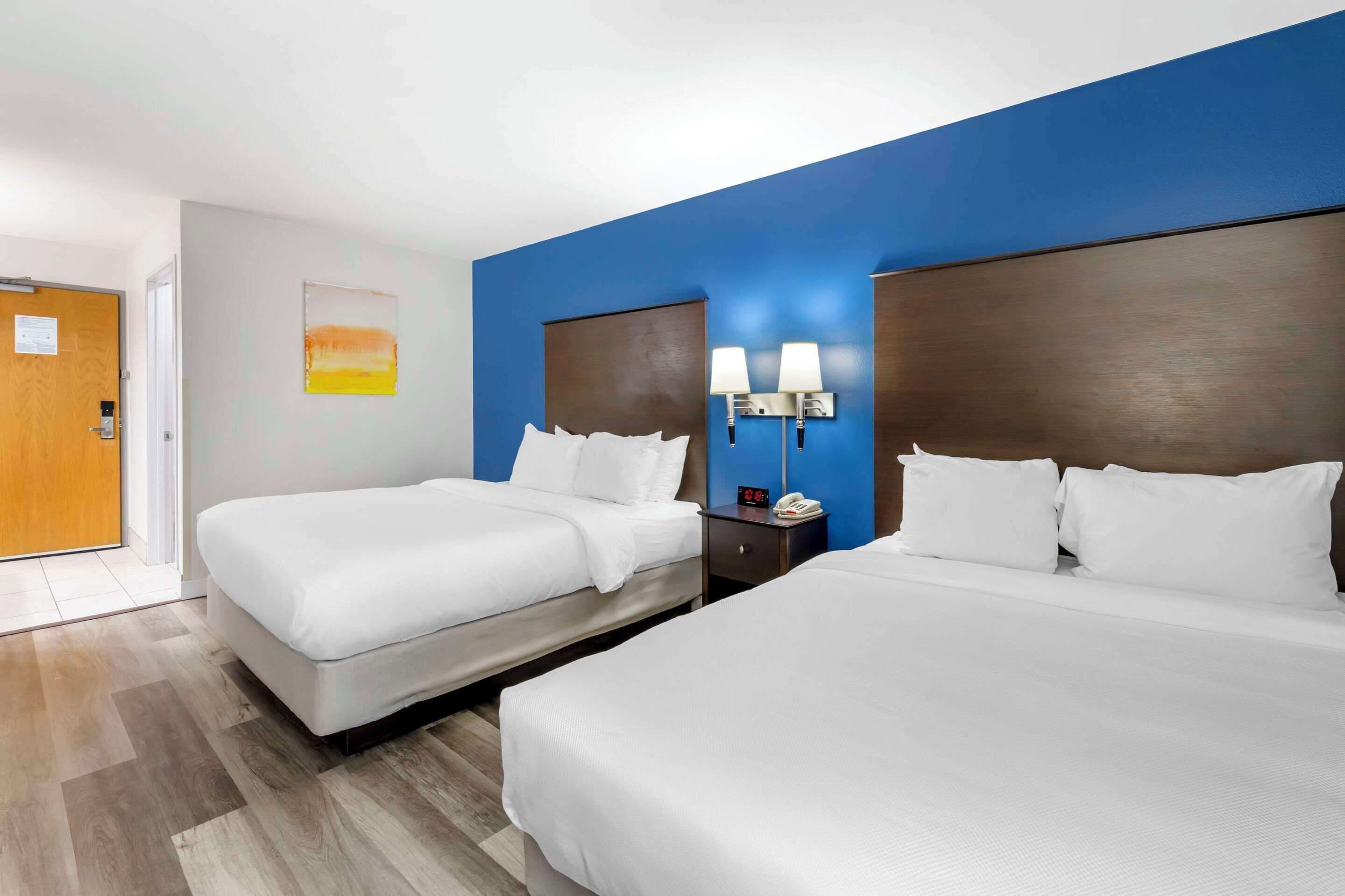 standard room, 2 queen beds, non smoking | individually decorated, individually furnished, desk, laptop workspace