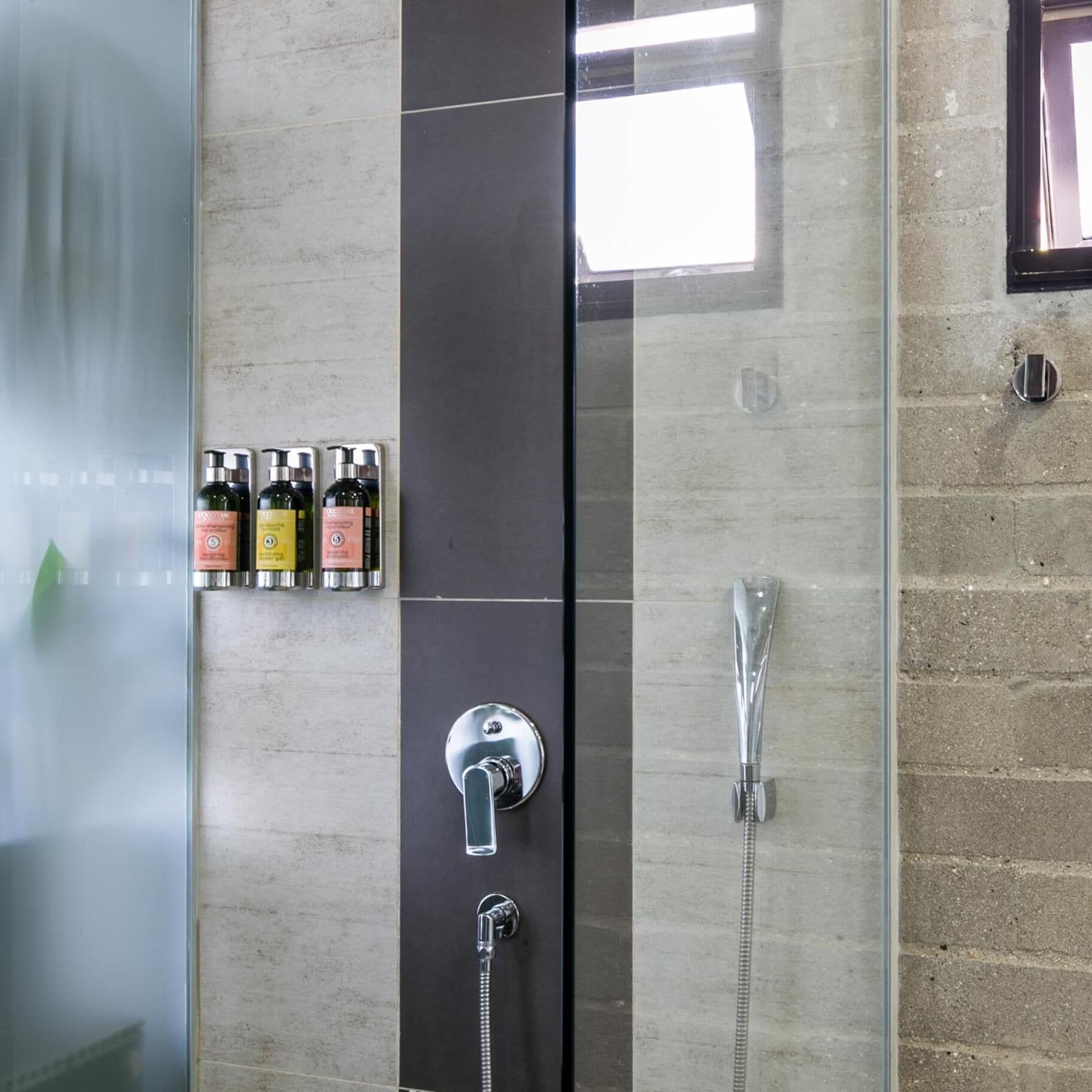 shower, free toiletries, hair dryer, towels