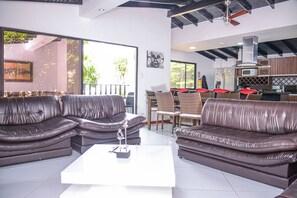 Superior Apartment, 6 Bedrooms | Living area | 32-inch flat-screen TV with cable channels, TV, DVD player