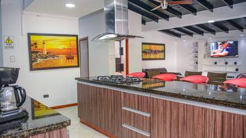 Superior Apartment, 6 Bedrooms | Private kitchen | Fridge, microwave, oven, stovetop