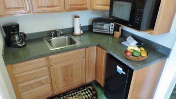 Fridge, microwave, coffee/tea maker, toaster