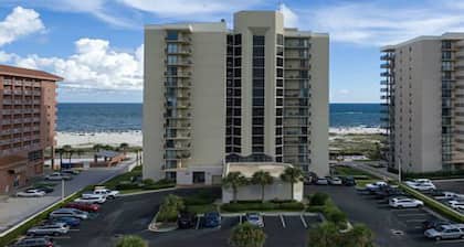 Walkout to beach, pool and splashpad 3 bedroom 2 bath ground floor condo.