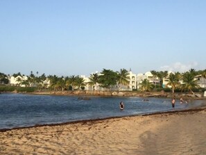 On the beach, sun loungers, beach towels