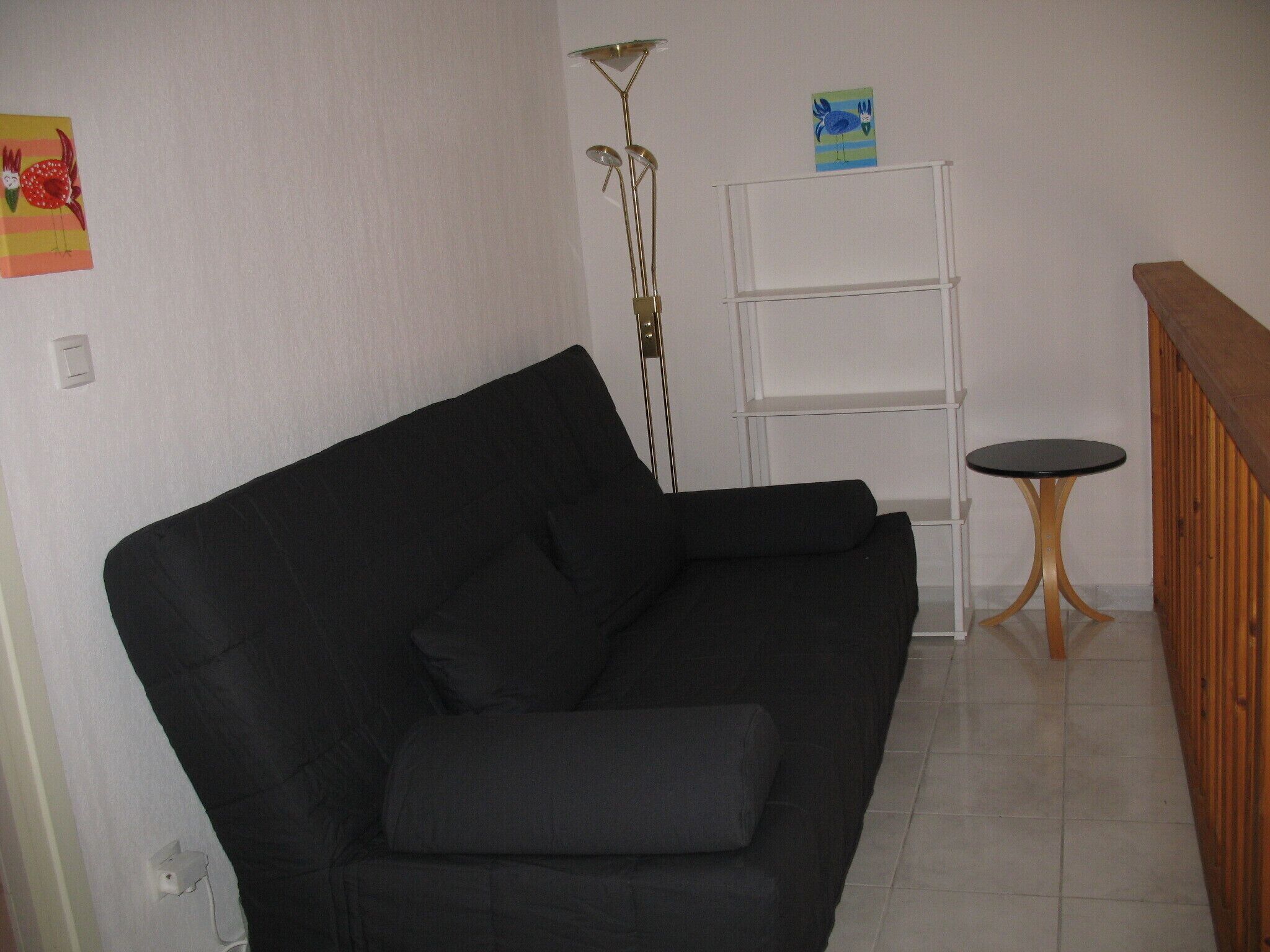 mezzanine :
1 canapé convertible en lit 140*200 