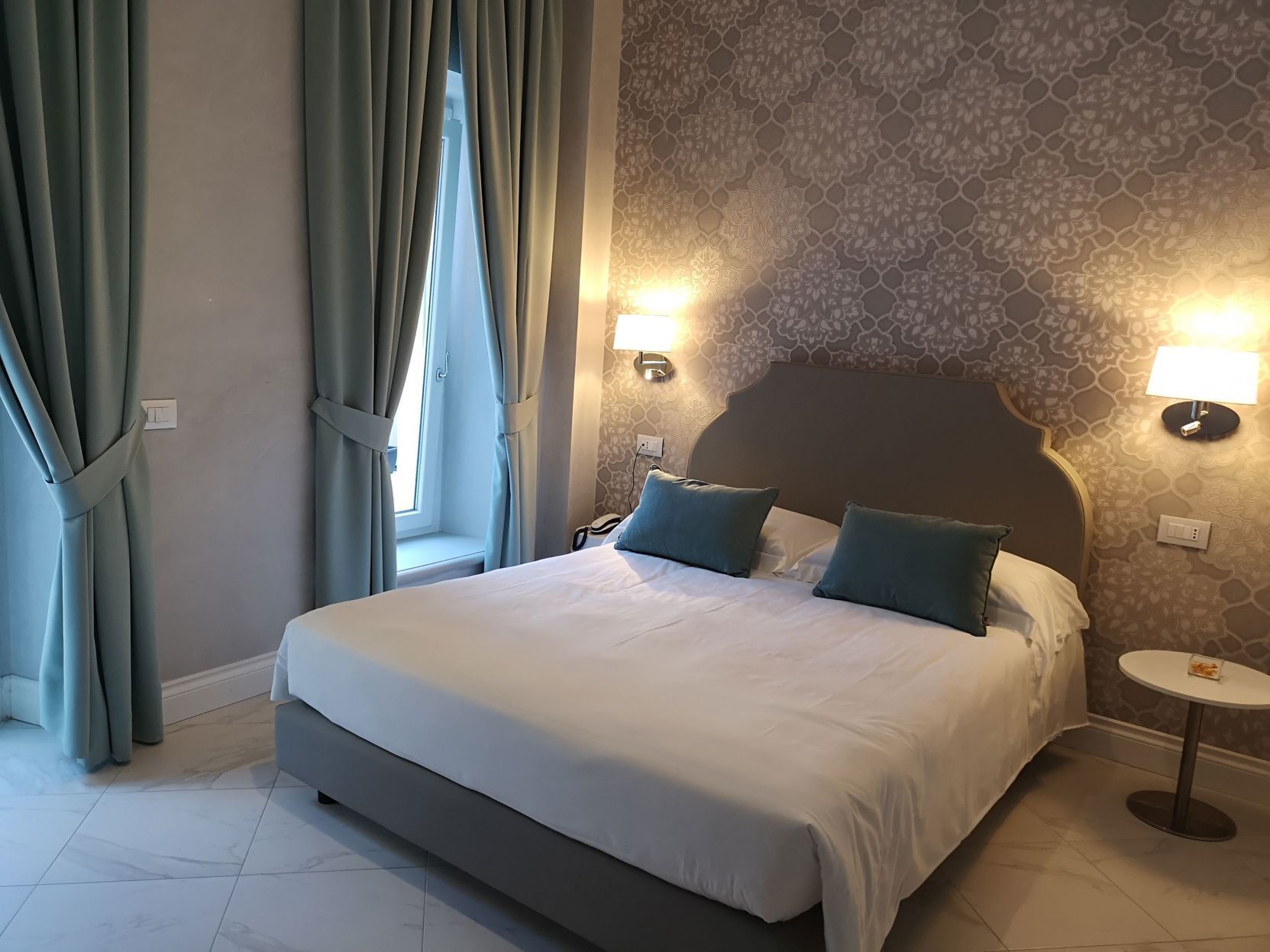 Premium bedding, down comforters, minibar, in-room safe