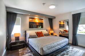 Deluxe Apartment, 2 Bedrooms, Pool Access | 1 bedroom, in-room safe, individually decorated, individually furnished