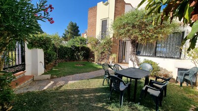 Detached house with sun view and shared pool.
