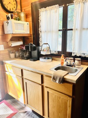 Fridge, microwave, coffee/tea maker, toaster