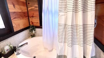 Shower, jetted tub, hair dryer, towels