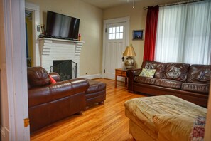 Smart TV, fireplace, books