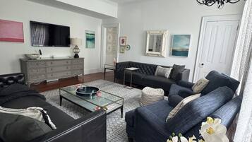 Smart TV, fireplace, books, music library